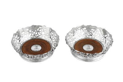 Lot 530 - A pair of Victorian sterling silver wine coasters, London 1849 by messrs Barnard