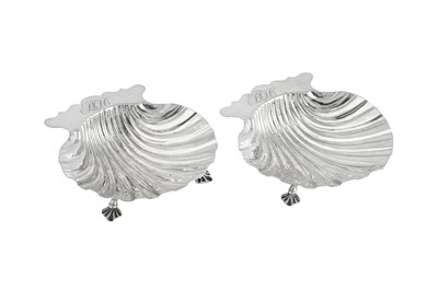 Lot 661 - A pair of George II sterling silver butter shells, London 1753 by Samuel Herbert and Henry Bailey  (reg. 6th Nov 1750)
