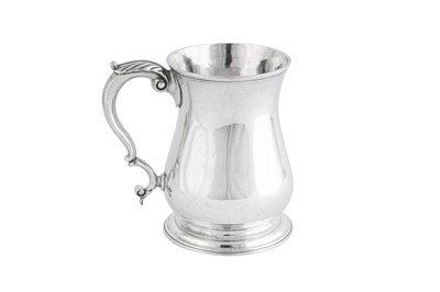 Lot 669 - A George II sterling silver pint mug, London 1754 by Thomas Whipham (first reg. 20th June 1737)