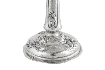 Lot 441 - An Edwardian ‘Arts and Crafts’ sterling silver comport, London 1905 by Latino Movio (1858 - 1949) for Holland, Aldwinckle & Slater