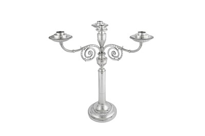 Lot 630 - A fine pair of George III sterling silver four-light candelabra, London 1800 by Robert Sharp