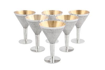 Lot 449 - A set of six Elizabeth II modernist sterling silver cocktail goblets, London 1966 by Gerald Benney (1930-2008)