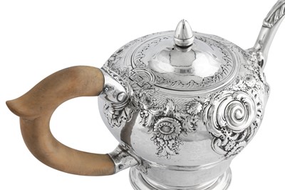 Lot 676 - A George II sterling silver teapot, London 1749 by Gabriel Sleath (reg. 18th June 1739)