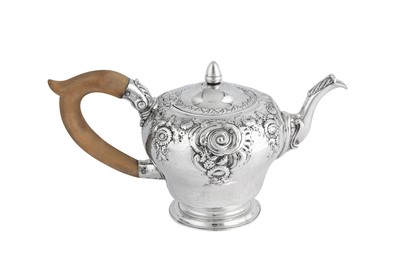 Lot 676 - A George II sterling silver teapot, London 1749 by Gabriel Sleath (reg. 18th June 1739)