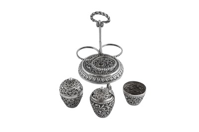 Lot 138 - An early 20th century Anglo – Indian silver cruet, Cutch, Bhuj circa 1900 by Oomersi Mawji jnr (active 1890-1930)