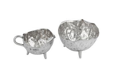 Lot 436 - A Victorian ‘Arts and Crafts’ sterling silver strawberry set, London 1883 by Hukin and Heath, the design attributed to Dr Christopher Dresser (1834-1904)