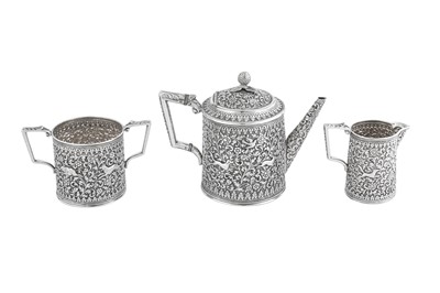 Lot 141 - A rare documentary late 19th century Anglo – Indian silver three-piece tea service, Cutch, Bhuj circa 1880 by Oomersi Mawji (active 1860-90)