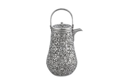Lot 109 - A late 19th century 20th century Anglo - Indian silver hot water or milk pot, Lucknow circa 1895
