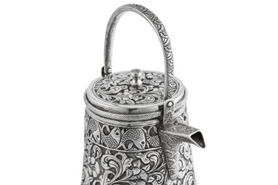 Lot 109 - A late 19th century 20th century Anglo - Indian silver hot water or milk pot, Lucknow circa 1895
