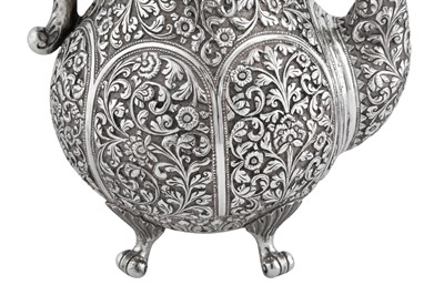 Lot 135 - A late 19th century Anglo - Indian unmarked silver coffee pot, Cutch circa 1880