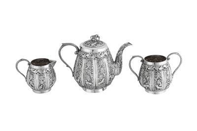 Lot 111 - A late 19th / early 20th century Anglo - Indian unmarked silver three-piece tea service, Lucknow circa 1900
