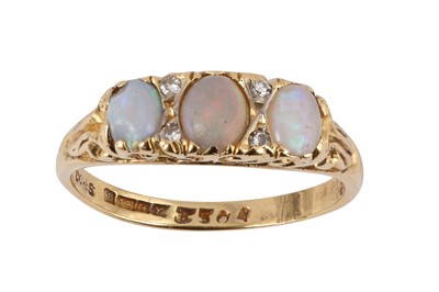 Lot 23 - A three-stone opal ring