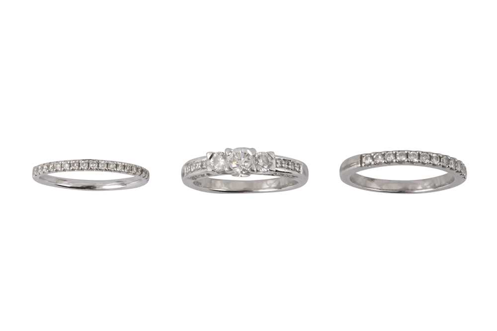 Lot 244 - THREE DIAMOND RINGS