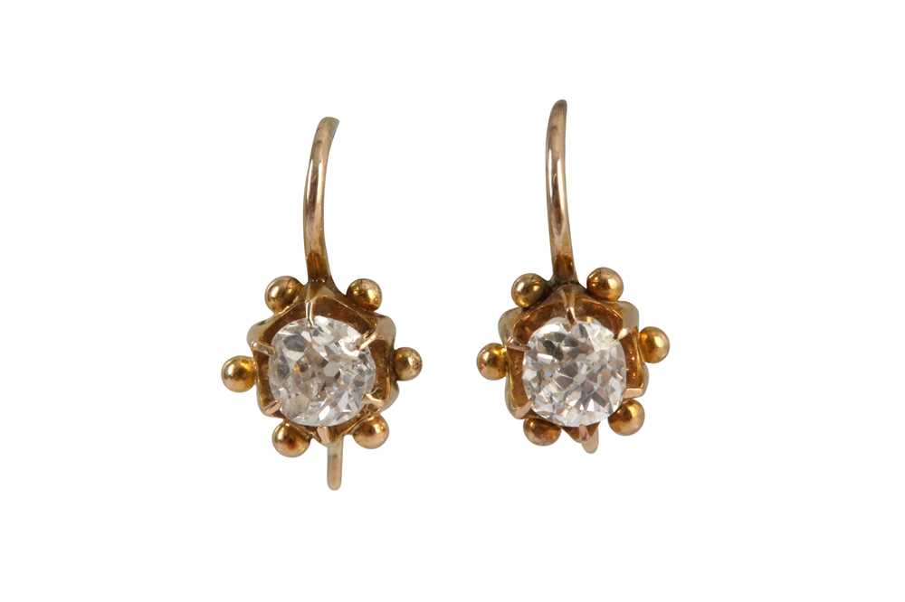 Lot 21 - A pair of diamond pendent earrings