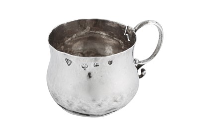 Lot 688 - A Charles II sterling silver miniature or child’s porringer, London 1663 by Clement Punge (free. 1637, d. 1666)