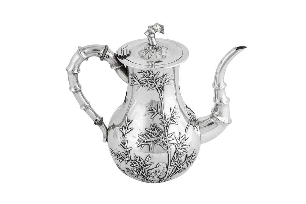 Lot 226 - An early 20th century Chinese Export silver coffee pot, Canton circa 1910 retailed by Chong Woo of Hong Kong