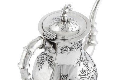 Lot 226 - An early 20th century Chinese Export silver coffee pot, Canton circa 1910 retailed by Chong Woo of Hong Kong