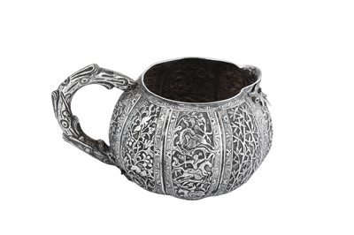 Lot 204 - A late 19th century Chinese Export unmarked silver milk jug, Jiujiang circa 1880 attributed to Tu Qing Yun