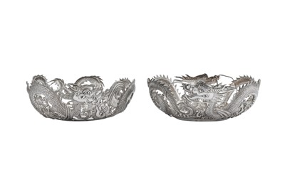 Lot 212 - A pair of early 20th century Chinese Export silver pierced bowls, Shanghai circa 1900 retailed by Wang Hing