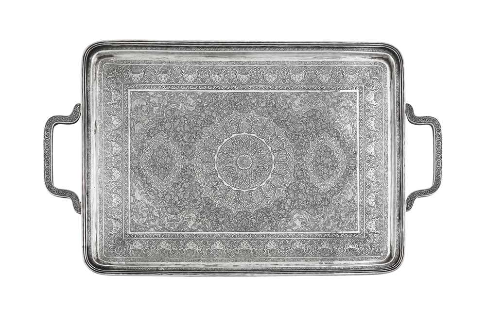 Lot 280 - A large mid-20th century Persian (Iranian) silver twin handled footed tea tray, Isfahan 1969-79 mark of Saraeian, retailed by Vartan