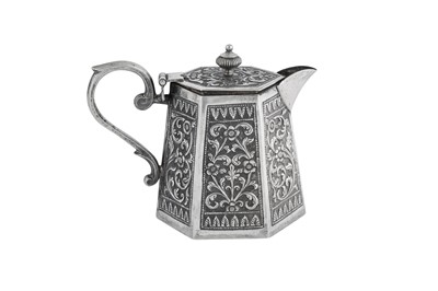 Lot 133 - An early 20th century Anglo – Indian unmarked silver covered milk jug, Cutch circa 1900