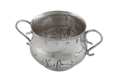 Lot 689 - A Charles II sterling silver miniature or child’s porringer, London 1660 by Gilbert Shepard (free 1631, d. 1667)