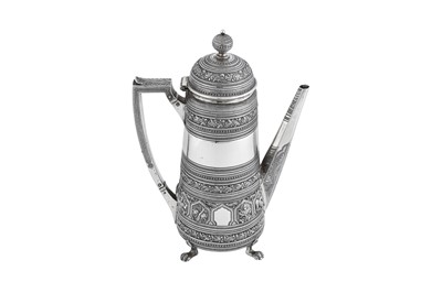 Lot 561 - A Victorian Scottish sterling silver 'Burmese pattern' coffee pot, Edinburgh 1876 by Edwin Millidge and Sons