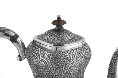 Lot 103 - A late 19th / early 20th century Anglo – Indian unmarked silver coffee pot, Kashmir circa 1900
