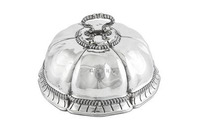 Lot 698 - Royal Ambassadorial – A pair of George III sterling silver second course dish covers, London 1771 by Thomas Heming overstriking James and Sebastian Crespell