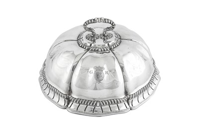 Lot 698 - Royal Ambassadorial – A pair of George III sterling silver second course dish covers, London 1771 by Thomas Heming overstriking James and Sebastian Crespell