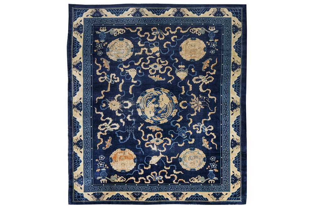 Lot 38 - AN ANTIQUE CHINESE CARPET