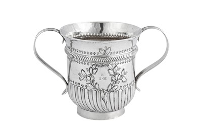 Lot 637 - A George III sterling silver twin handled cup, London 1767 by Samuel Whitford I