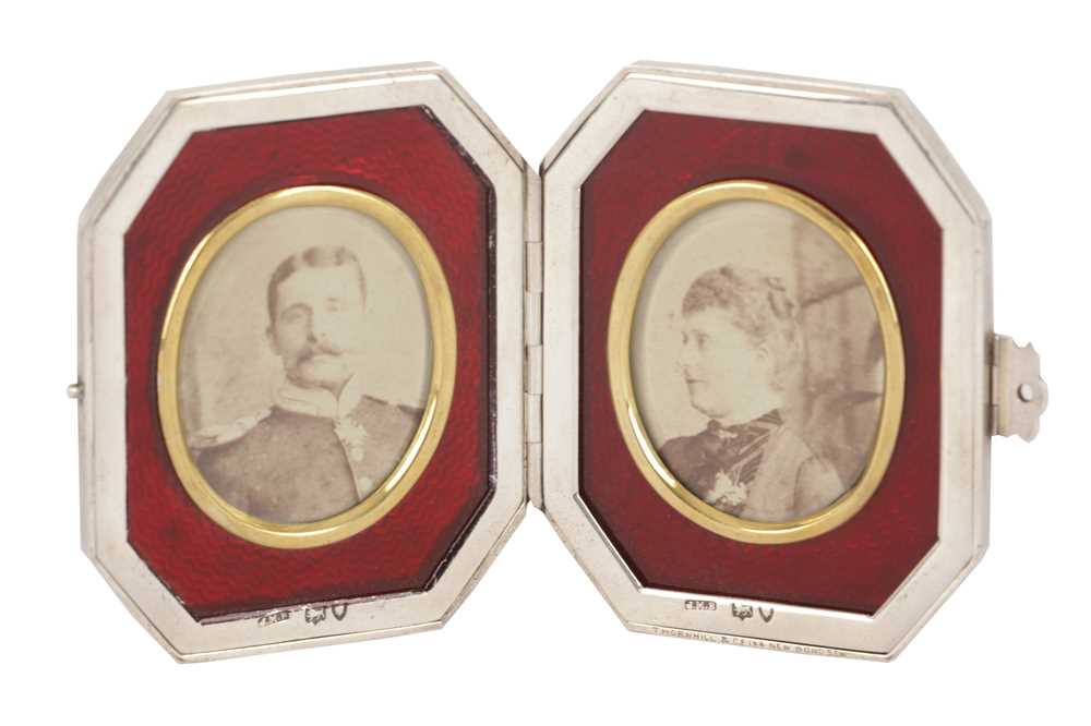 Lot 29 - SILVER GUILLOCHE ENAMEL DIPTYCH FRAME WITH PHOTOGRAPHS OF PRINCE HARRY OF BATTENBERG AND PRINCESS BEATRICE