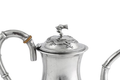 Lot 225 - An early 20th century Chinese Export silver coffee pot, Shanghai circa 1910 retailed by The China Jewellery Company