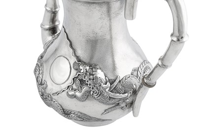 Lot 225 - An early 20th century Chinese Export silver coffee pot, Shanghai circa 1910 retailed by The China Jewellery Company