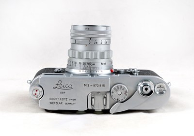 Lot 166 - Single Wind Leica M3 Rangefinder Body with 5cm Summicron Lens.