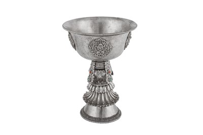 Lot 249 - An early to mid-20th century Tibetan unmarked silver butter lamp, circa 1930-50