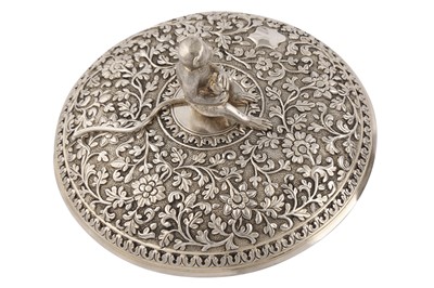 Lot 140 - A fine late 19th century Anglo – Indian unmarked silver butter dish on stand, Cutch, Bhuj circa 1870 attributed to Oomersi Mawji (active 1860-90)