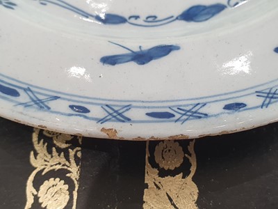 Lot 146 - TWO SMALL DELFTWARE POTTERY PLATES, CIRCA 1780-1800