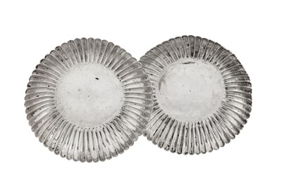 Lot 536 - A pair of late 17th / early 18th century Chinese silver tea bowl saucers, circa 1700