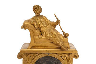 Lot 689 - AN ORIENTALIST ORMOLU MANTEL CLOCK WITH SMOKING TURK