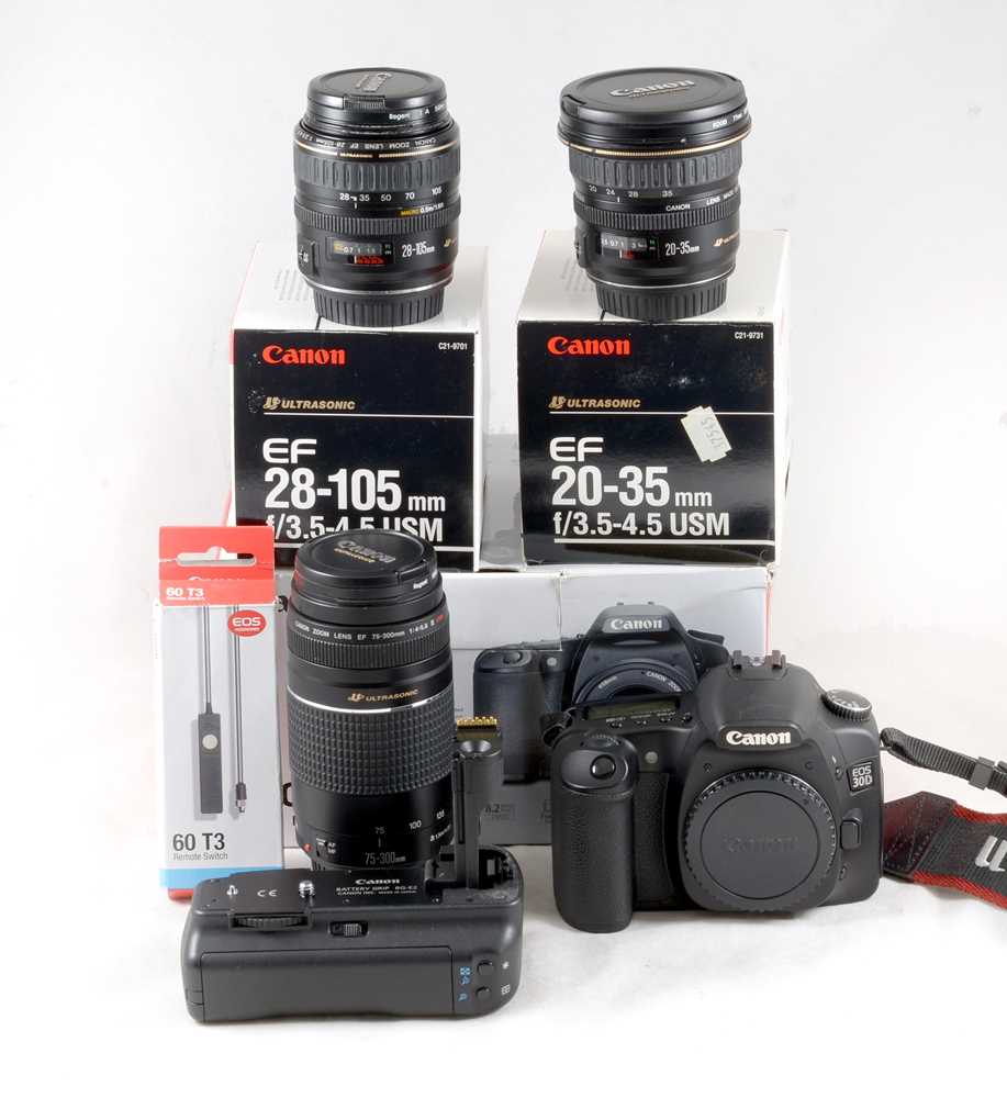 Lot 588 - 3-Lens Canon EOS30D DSLR Outfit.