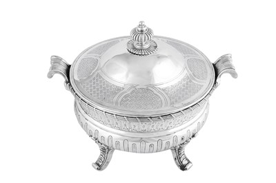 Lot 699 - A rare early George III sterling silver soup tureen, London 1765 by James and Sebastian Crespell