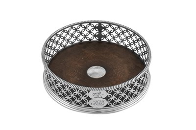 Lot 609 - A George III sterling silver wine coaster, London 1772 by Edward Lowe