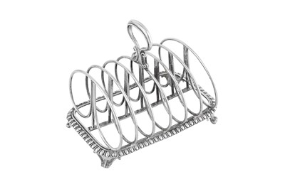 Lot 575 - A George IV sterling silver seven bar toast rack, London 1829 by Benjamin Smith III