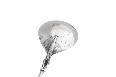 Lot 303 - A late 17th century Dutch silver spoon, Amsterdam 1696, makers mark obscured possibly P?