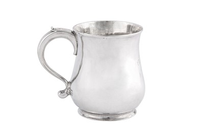 Lot 664 - A George II sterling silver small mug, London 1738 by Thomas Whipham (first reg. 20th June 1737)