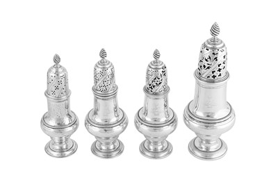 Lot 615 - A set of three George III sterling silver casters, London 1765 by John Delmester
