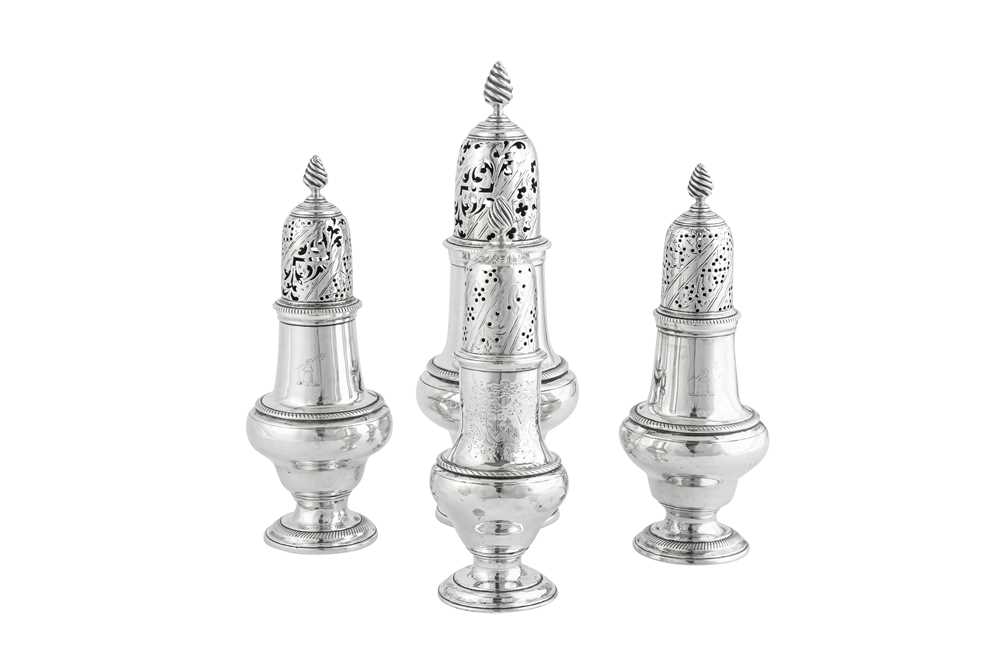 Lot 615 - A set of three George III sterling silver casters, London 1765 by John Delmester