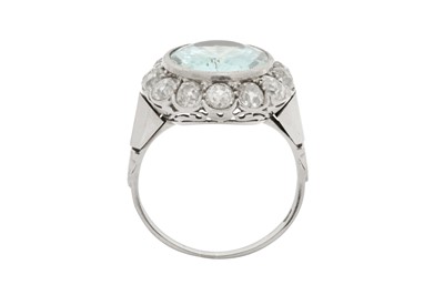 Lot 64 - An aquamarine and diamond cluster ring
